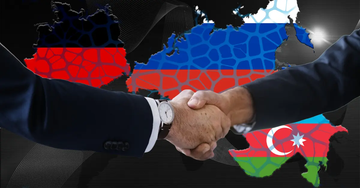 Handschlag vor Russland- und Aserbaidschan-Karte — Symbolbild für das Baku-Treffen zwischen deutschen Ex-Politikern und Putin-Vertrauten